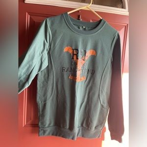 Long sleeve light weight sweatshirt.  Yellowstone Hunter Green